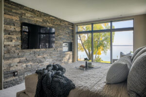 bedroom with stone accent well