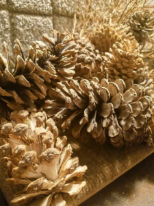 decorate mantel for christmas pine cones